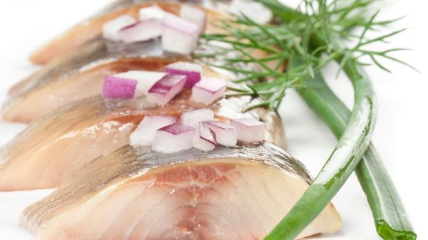 Herring Halves Onion Dill White Background wallpaper