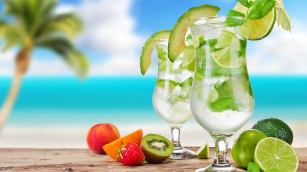 Mojitos Cocktails Glasses Umbrellas Berries Fruit Citrus Lime wallpaper