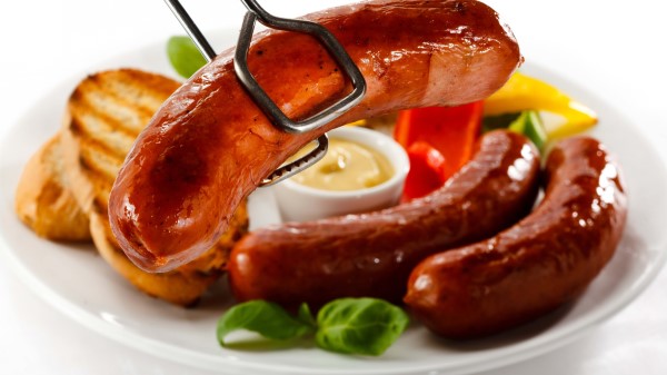 Sausages Plate White Background wallpaper