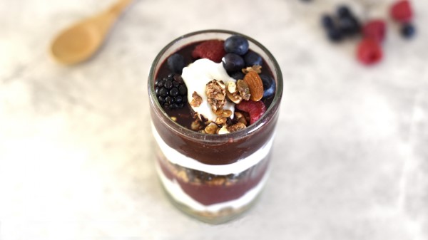 Yogurt Raspberries Blueberries Blackberries Nuts Chocolate wallpaper