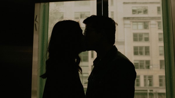 Couple Kiss Silhouettes Window wallpaper