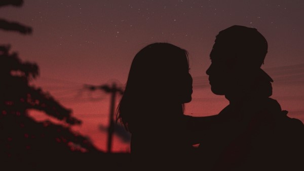 Couple Silhouettes Hugs Night Starry Sky wallpaper