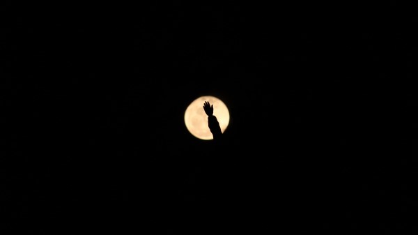 Moon Hand Silhouette wallpaper
