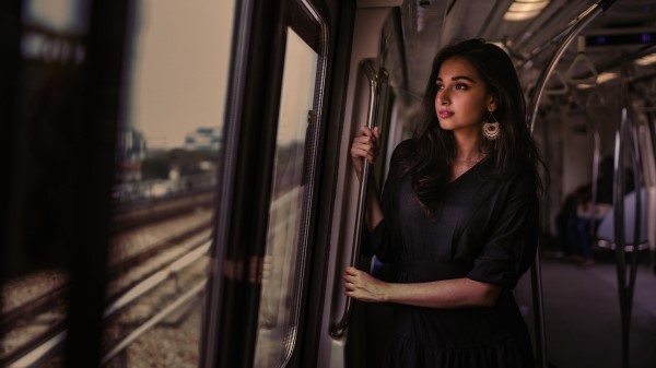 Beautiful Woman Black Dress Brunette Train 4k Wallpaper
