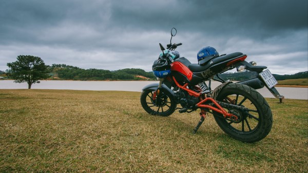 Motorcycle Side View Grass Wallpaper