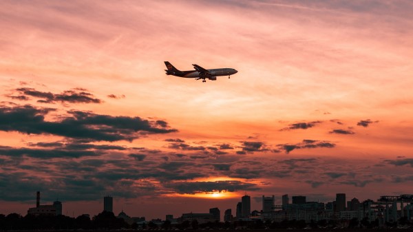 Airplane Sky Flight Clouds Sunset Wallpaper