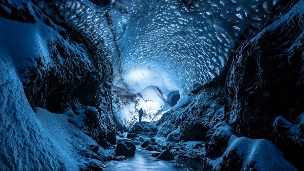 Glacier Cave Man Wallpaper