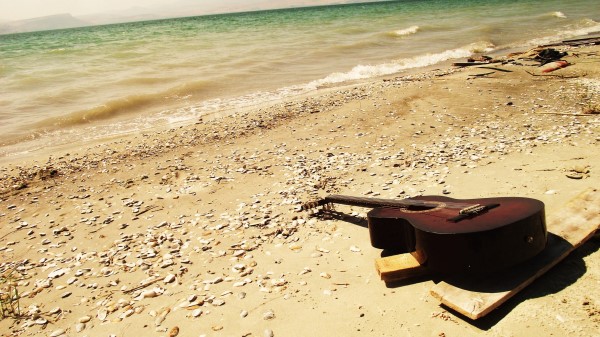 Guitar Beach Coast Sand Stones Romanticism Wallpaper