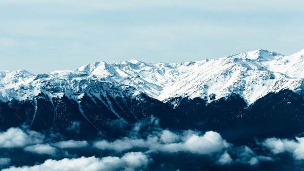 Mountains Fog Peaks Snowy Wallpaper