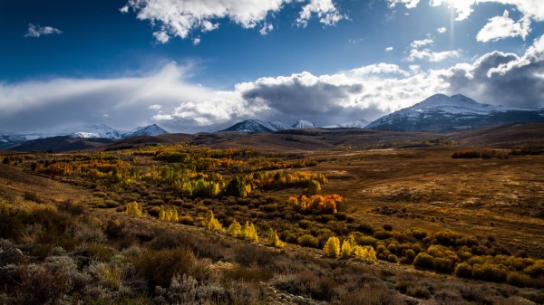 Mountains Grass Clouds Wallpaper