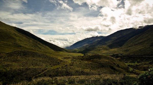 Mountains Grass Sky Wallpaper