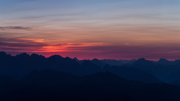 Mountains Sunset Sky Horizon Wallpaper
