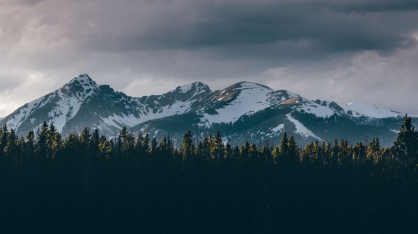 Mountains Trees Tops Snow Sky Wallpaper