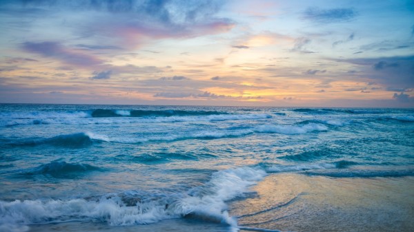 Ocean Waves At Sunset Wallpaper