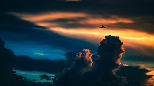 Plane Sky Night Clouds Sunset Wallpaper