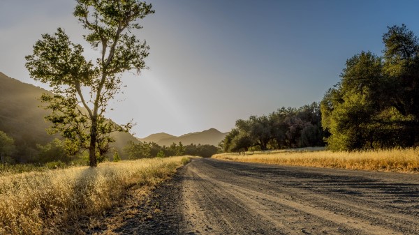 Road Trees Mountains Sunlight Wallpaper