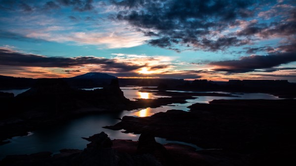 Rocks Water Sunset Wallpaper