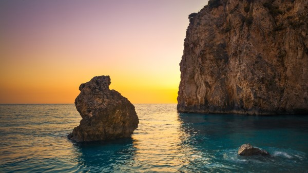 Sea Boulders Sky Sunrise Wallpaper