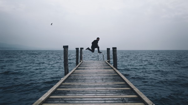 Sea Horizon Man Jump Wallpaper