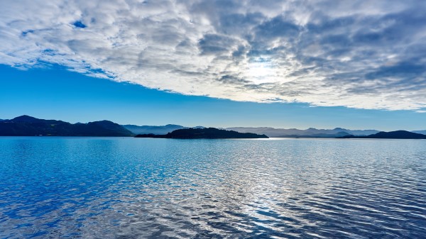Sea Mountains Sky Clouds Wallpaper
