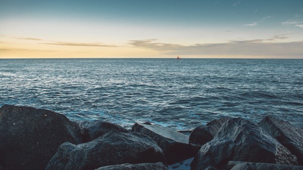 Sea Stones Boat Horizon Wallpaper