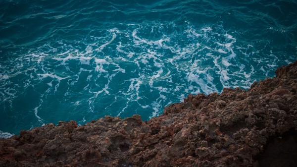 Sea Stones Foam Water Wallpaper