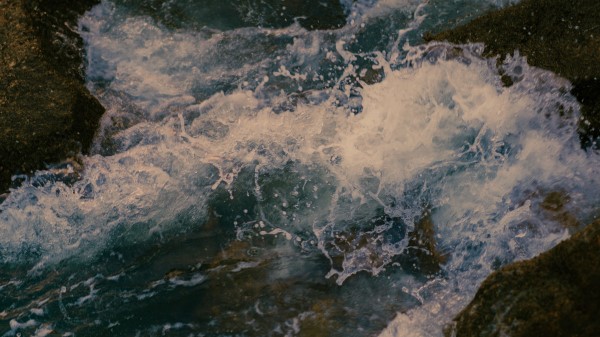 Sea Stones Spray Wallpaper