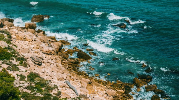 Shore Sea Stones Wallpaper