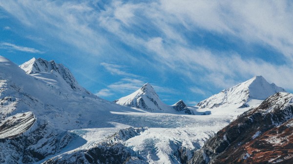 Snowy Mountains Top Sky Clouds wallpaper