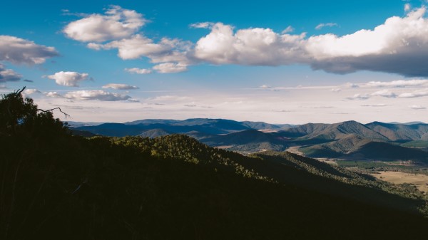 Valley Mountains Shadows Clouds wallpaper