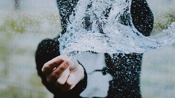 Spray Water Hands wallpaper