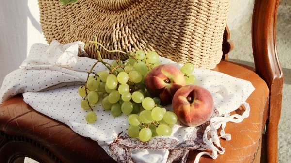 Sunflowers Grapes Peach wallpaper