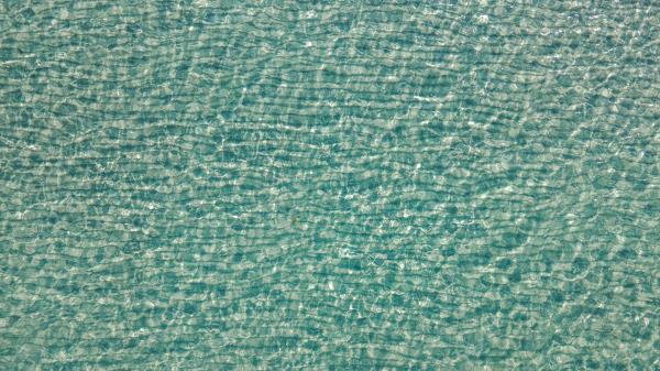 Water Ripples Glare Wallpaper